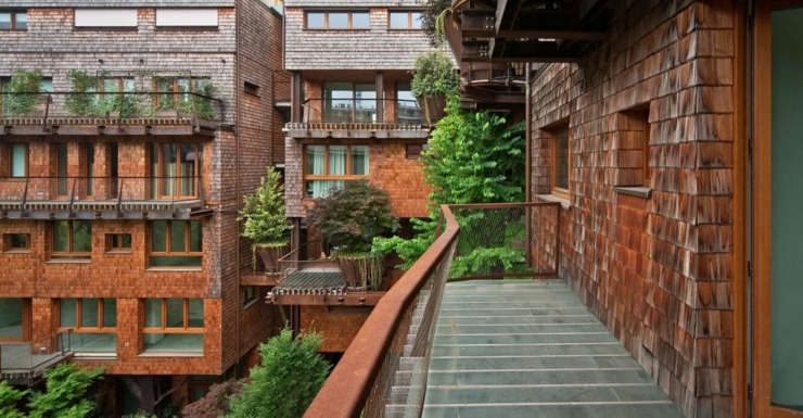 Immeuble complexe en bois avec un patio intérieur balcon immeuble appartement écologique