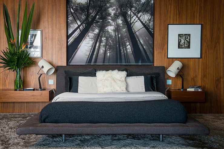 Chambre à coucher au décor chaleureux tout en bois chambre du petit appartement avec vue sur la mer
