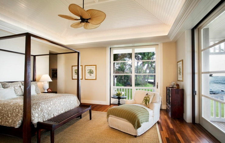 Chambre avec lit à baldaquin et magnifique vue sur la mer design chambre exotique hawai