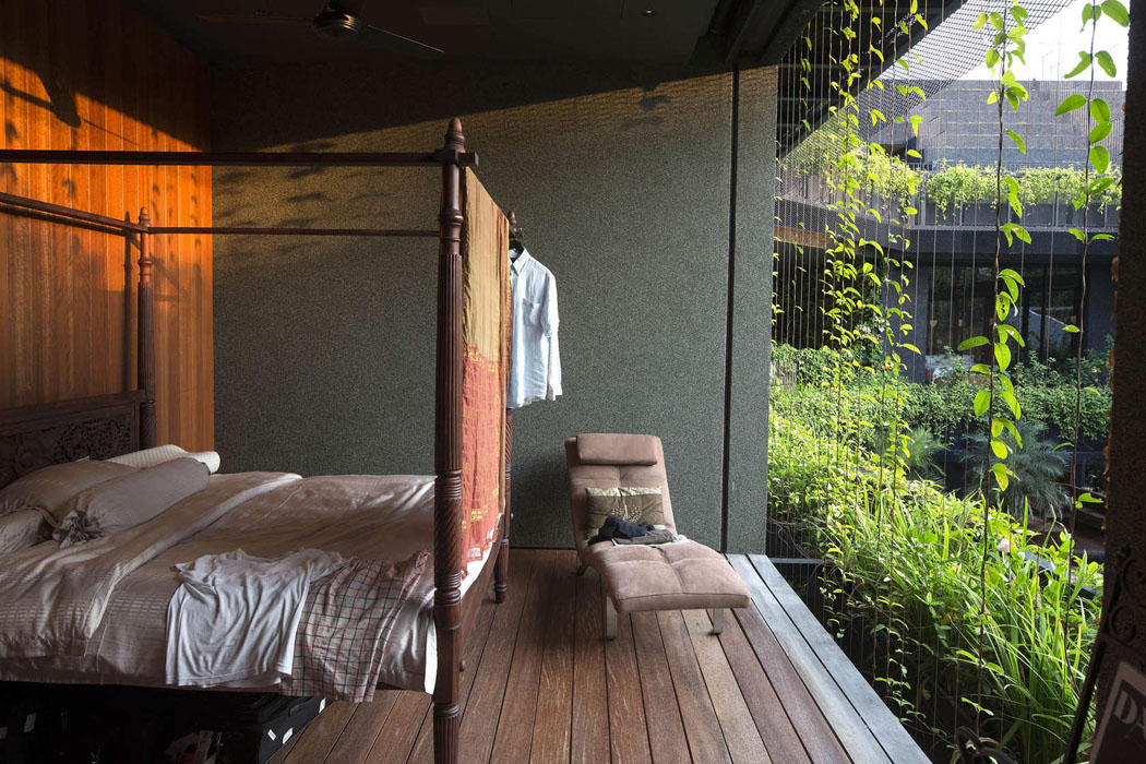 Une idée intéressante pour une chambre à coucher dans un espace très ouvert ouverture exotique chambre maison verte