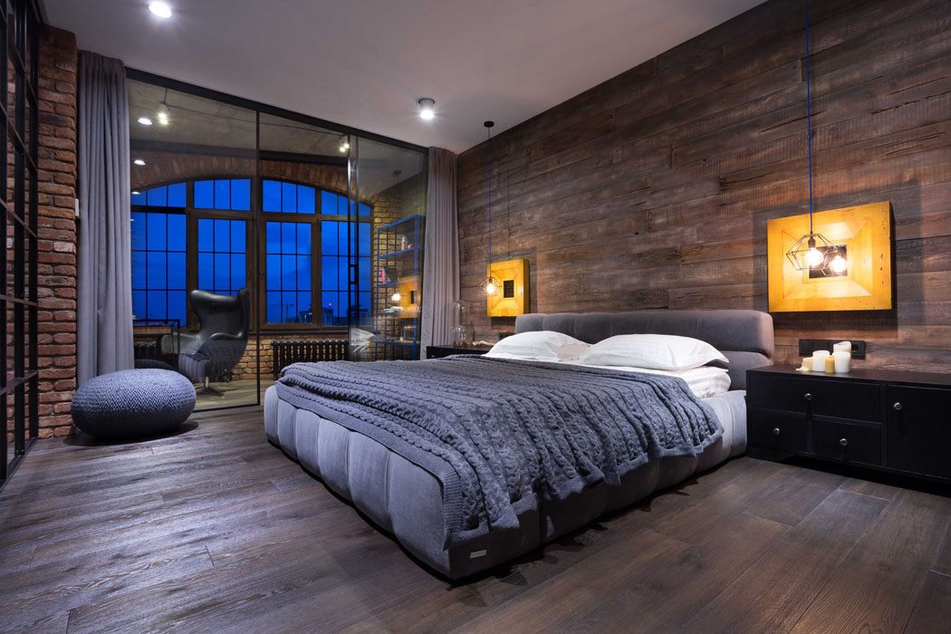 La chambre est séparée du bureau par un mur transparent de style verrière d’intérieur chambre à coucher déco masculine