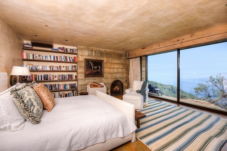 Chambre à coucher avec bibliothèque personnelle et la belle vue chambre vue sur l'océan résidence secondaire