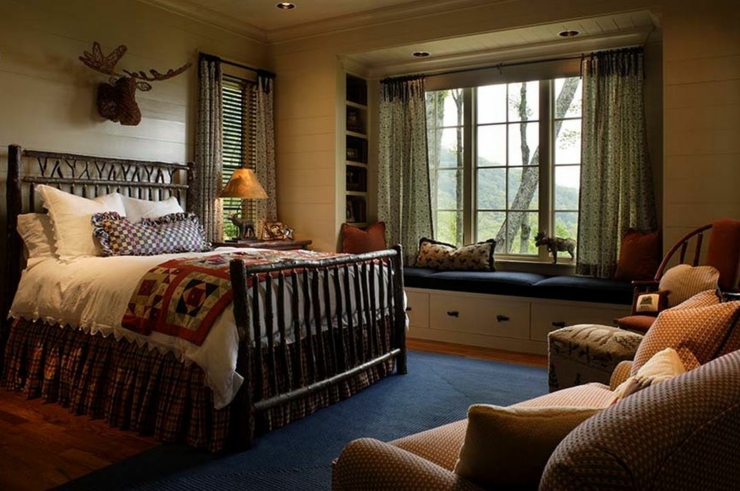 Chambre avec plaid et coussins à la déco très campagnarde design déco chambre campagnarde