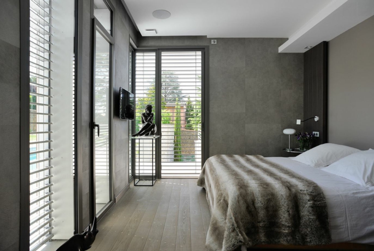 Chambre à la décoration et ameublement sobre chambre à coucher gris béton