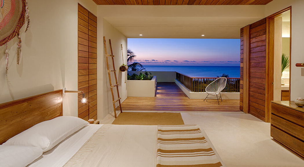 Une des chambres à l’intérieur exotique avec vue superbe sur la mer chambre avec vue mer villa de vacances