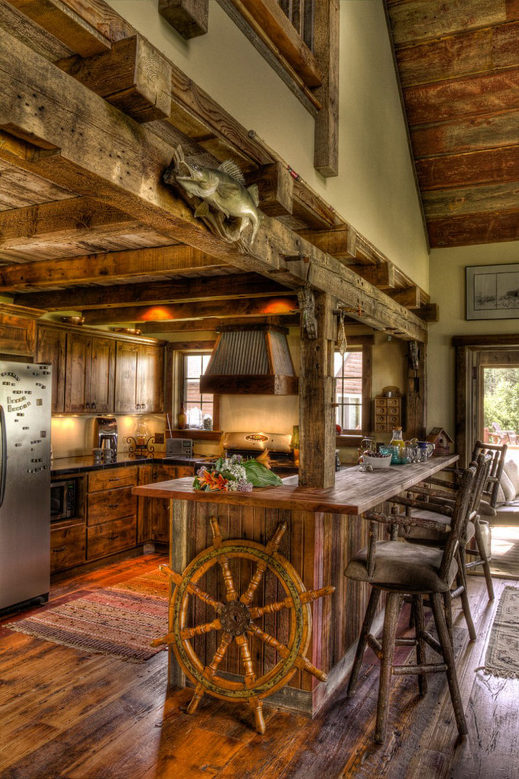 Résidence secondaire en pleine nature à utiliser pendant les quatre saisons de l’année cuisine ouverte design rustique villa de campagne