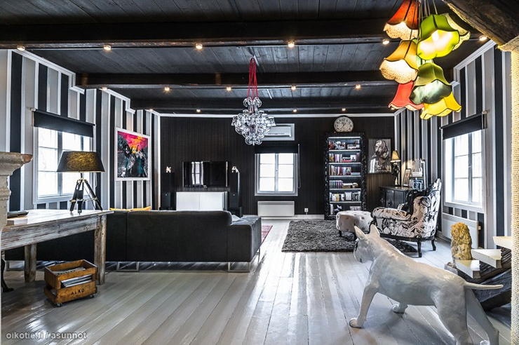 Intérieur de cette artistique maison en bois aux touches rustiques mais élégantes Séjour résidence secondaire campagne luxe