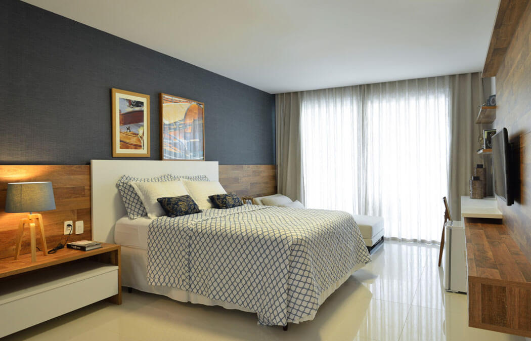 L’une des cinq chambres à coucher qui se trouvent à l’étage de la résidence chambre lit double maison familiale design contemporain