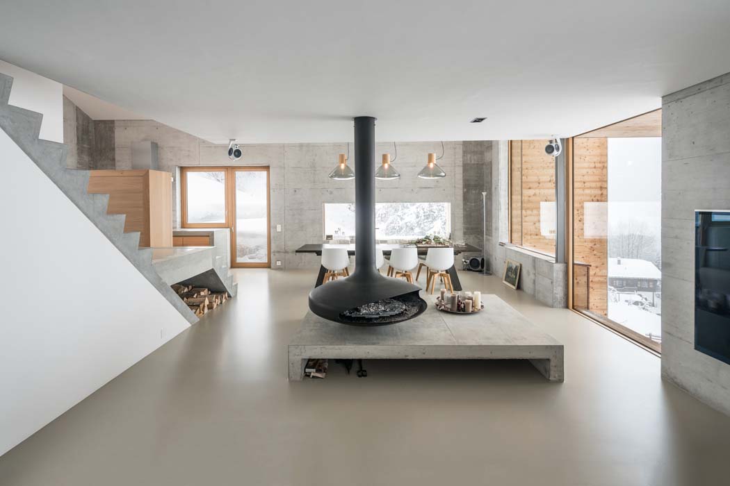 Design minimaliste, moderne et éclectique de ce chalet de montagne luxueux et familial salon luxe et contemporain béton chalet
