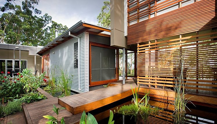 Le bois – un matériau omniprésent maison en bois écologique verte