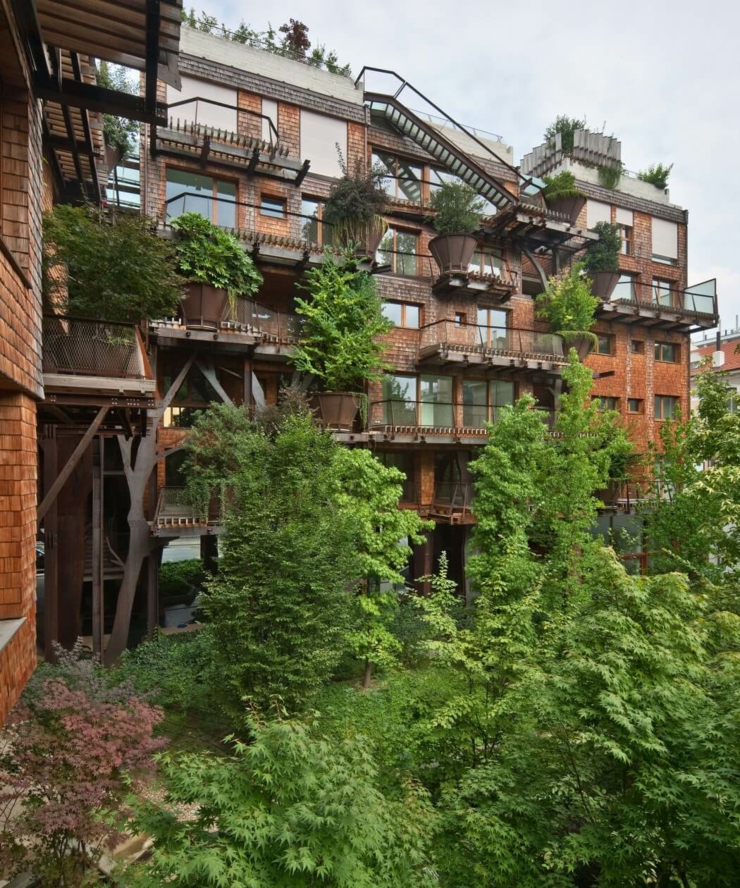 L’immeuble composé de logements citadins écologiques bâtiment vert arbre écologique