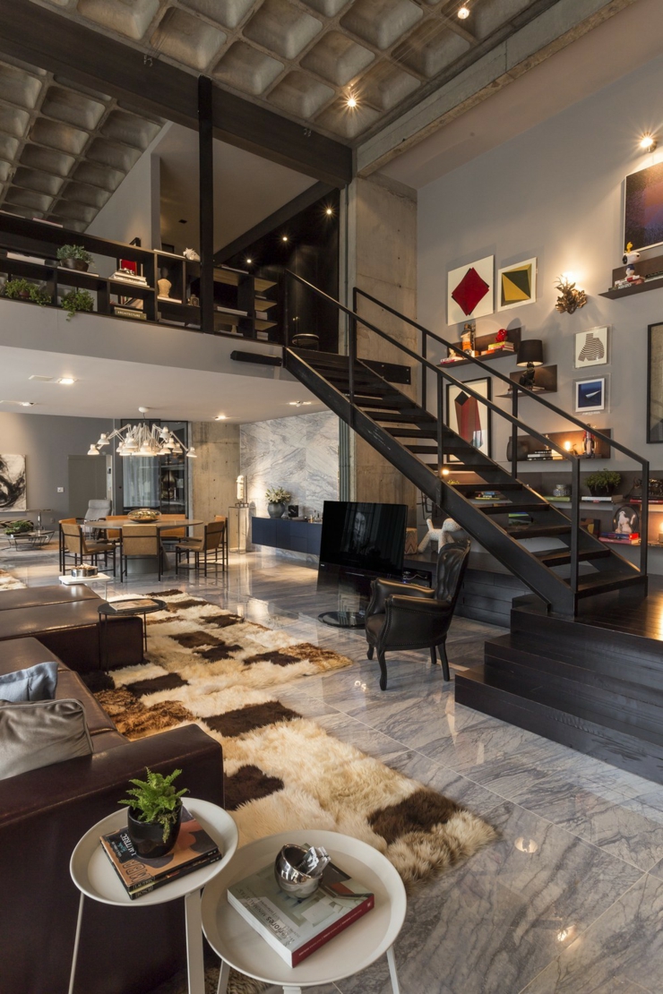 Intérieur à l’agencement original de cette villa de vacances séjour escalier mezzanine design luxe
