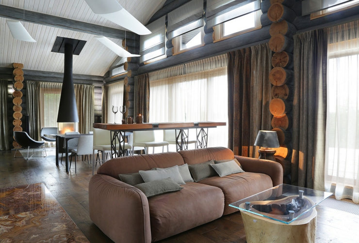Bois brut et bois travaillé pour une ambiance conviviale construction rondins en bois maison