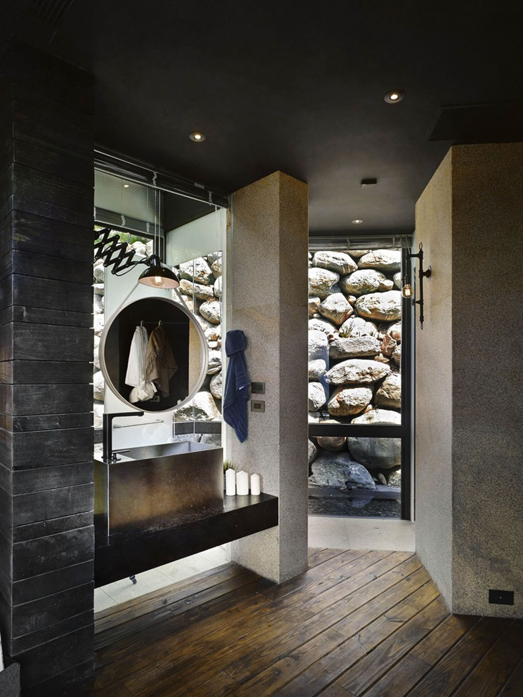 La salle de bain privative de la chambre principale au design élégant et un brin rustique belle salle d'eau design rustique pierre