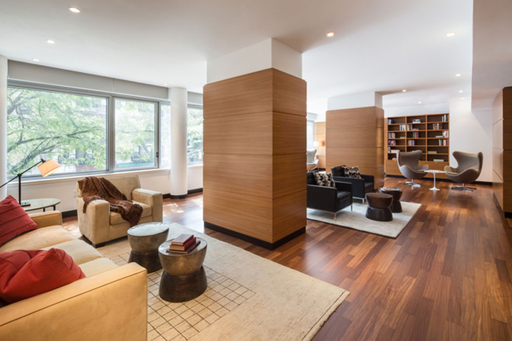 Le lobby d’affaires & bibliothèque faisant partie des services et prestations proposés intérieur design luxe immeuble de standing