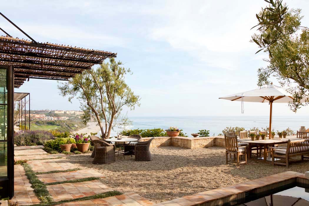 La terrasse de cette résidence de vacances dévoile une magnifique vue sur la plage et l’océan terrasse patio avec imprenable panorama sur l'océan