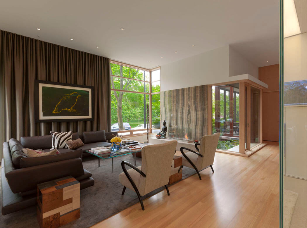Séjour près de l’entrée de cette maison en bois séjour en bois maison belle demeure citadine familiale