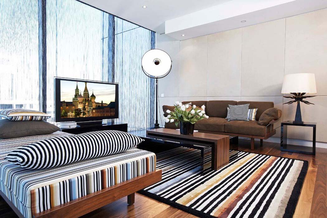 Un mobilier aux formes droites et minimalistes créant une ambiance de tendance moderne salon mezzanine de télévision