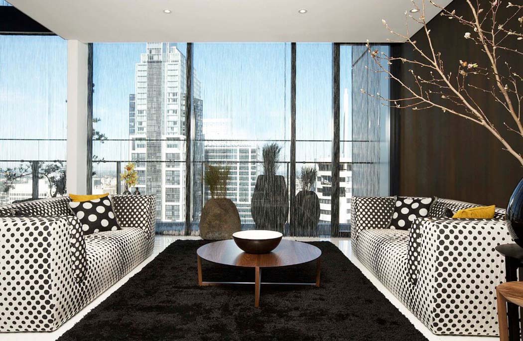 Une influence citadine créative pour l’ambiance du séjour du premier niveau de ce penthouse luxe séjour ameublement canapé original