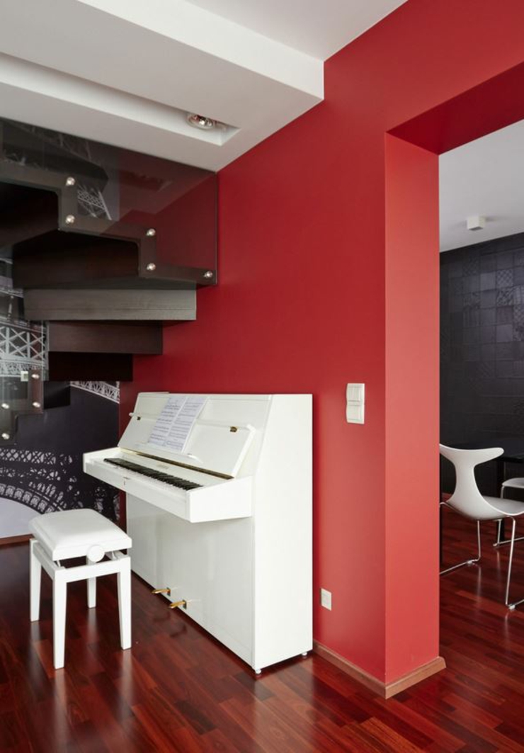 Coin dédié à la musique avec un piano blanc petit coin musique piano blanc