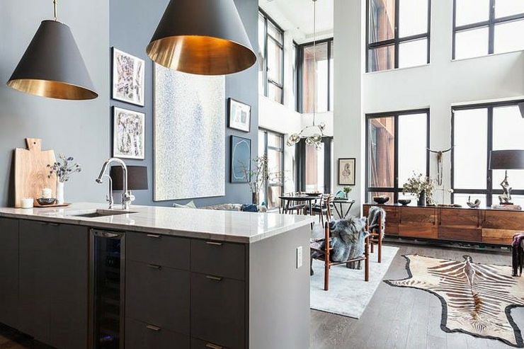 Décoration personnelle et éclectique inspirée par les voyages cuisine ouverte loft américain industriel