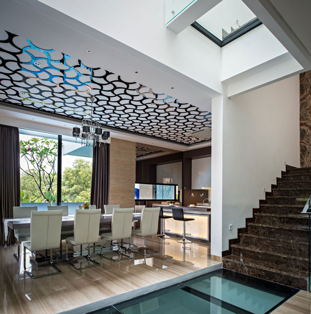 Une architecture qui vaut le détour pleine de grâce et d’originalité créative salle à manger et escalier intérieur résidence de standing