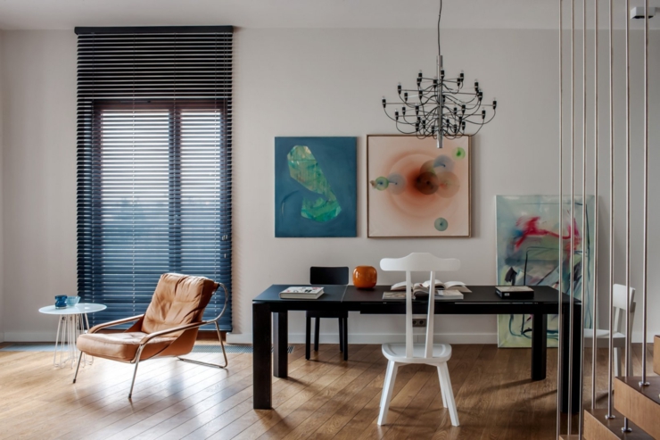 La salle à manger située entre la cuisine et le séjour salle à manger appartement loft