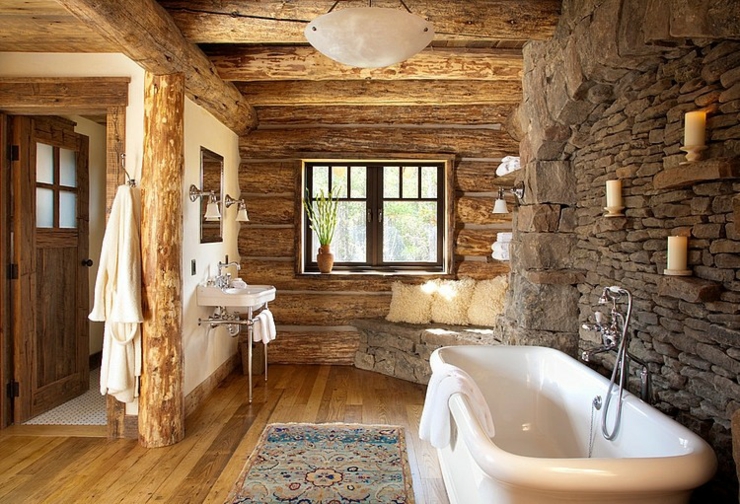 Une des salles de bains au design unique de la propriété salle de bains design rustique en pierres