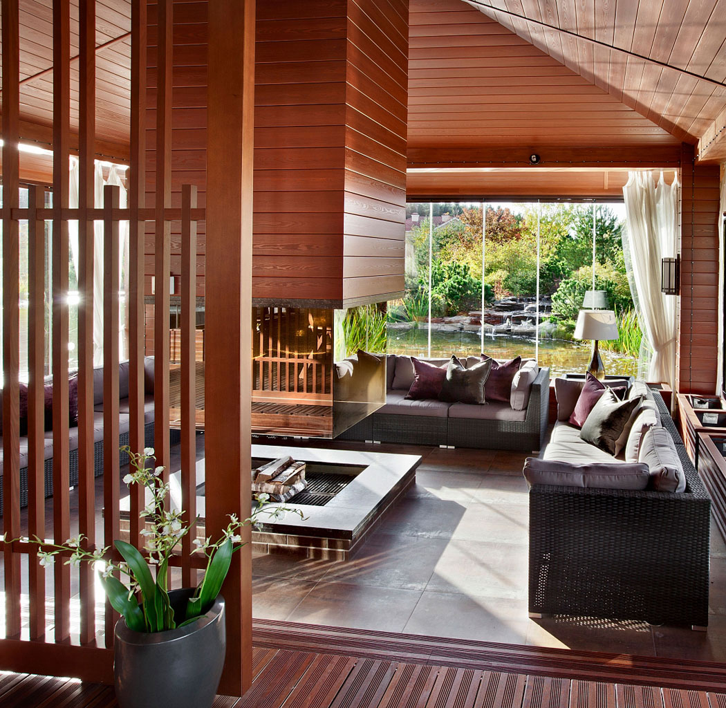 salon en bois massif avec vue jardin