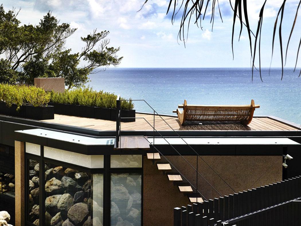 Le toit de cette belle villa de vacances exotiques transformée en terrasse avec vue imprenable vue panoramique sur mer villa à louer