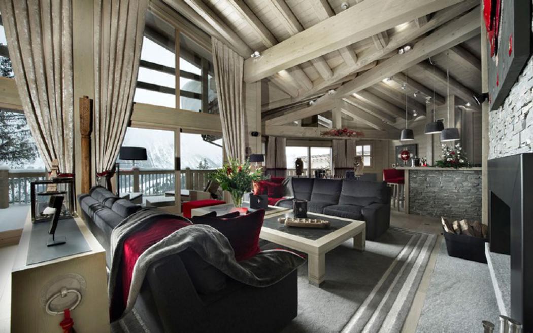 Pièce de vie principale à la vue sur toute la vallée chalet de montagne luxueux courchevel