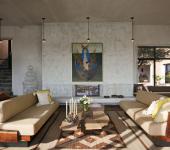 Le séjour de cette jolie location de vacances mexicaine villa au design industriel et rustique