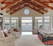 Chambre à coucher avec vue sur la mer de cette résidence de vacances belle maison secondaire rustique