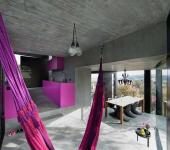 maison originale en béton et verre suisse