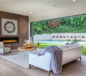 Jolie maison neuve dont le séjour se transforme en patio pendant les beaux jours maison familiale de standing belle demeure moderne