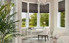 Petite table de toilette en blanc et une décoration créative en toute sobriété chambre luxueuse avec vue