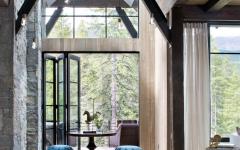 Une magnifique vue sur le paysage environnant confère un charme authentique à cette belle demeure chalet de montagne luxe intérieur design rustique élégant
