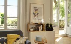 Les grandes fenêtres ainsi que la porte-fenêtre de l’appartement rendent l’ambiance agréablement chaleureuse design intérieur appartement renové besançon