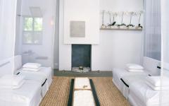 Séjour cabane design minimaliste en blanc
