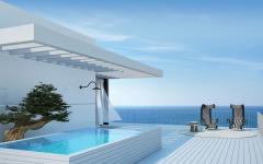 La piscine et les fauteuils outdoor très design pour des bains de soleils en tout confort piscine et pergola terrasse appartement de vacances avec vue