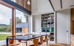 Cette maison neuve est conçue en jouant sur la hauteur et l’espace intérieurs salle à manger maison intérieur minimaliste architecte