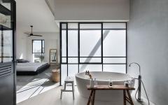 Une salle de bains ouverte au design minimaliste fait partie de la chambre principale salle de bain ameublement minimaliste ouverte