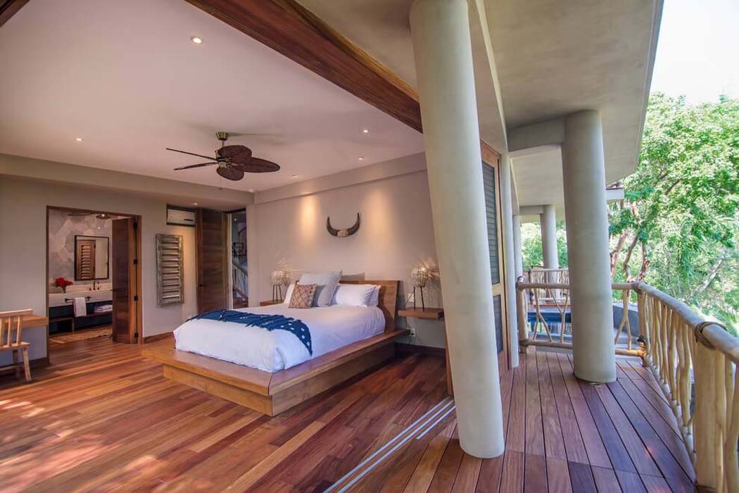 chambre suite parentale avec balcon et vue
