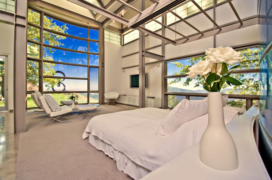 Petit salon aménagé dans la chambre principale et une vue superbe sur l’outdoor Vue superbe à partir de la suite de sparents