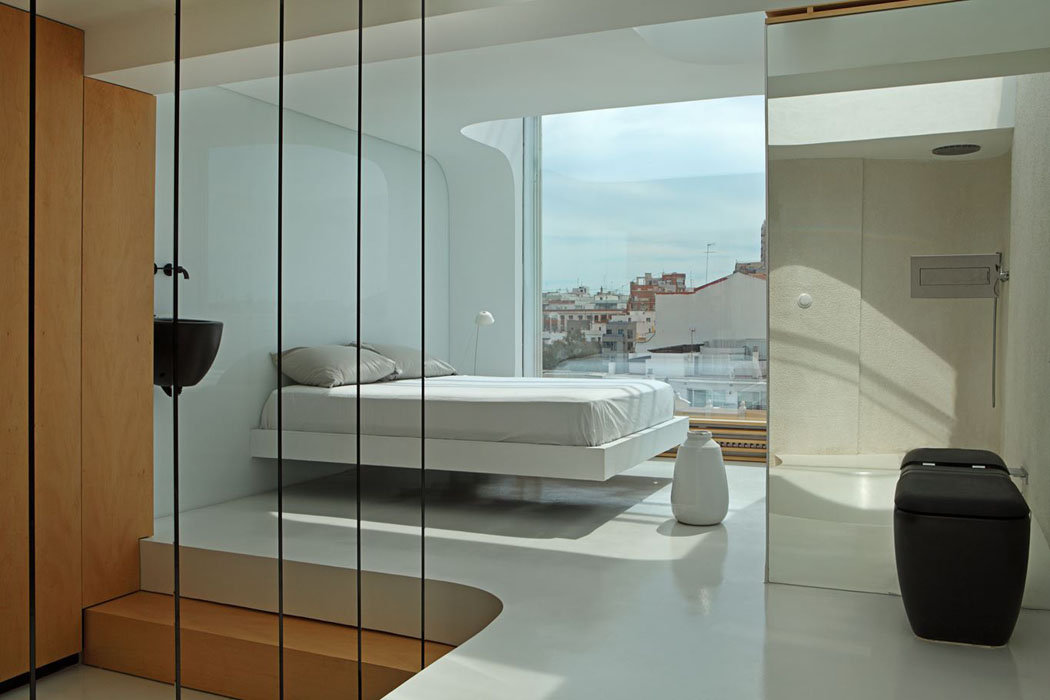 C’est à partir de la chambre à coucher que l’on peut observer une belle vue chambre minimaliste avec vue sur la ville