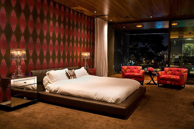 Une des chambres à l’étage de la maison d’architecte chambre épurée moderne très design
