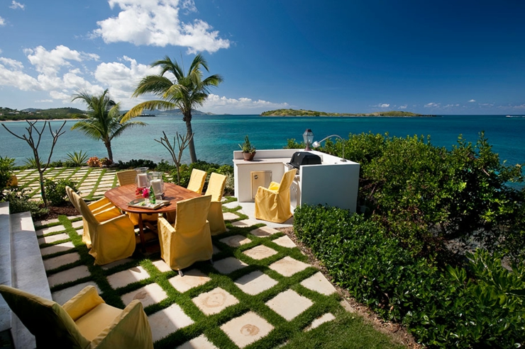 Terrasse avec barbecue et vue unique sur l’eau turquoise espaces extérieurs unique vue sur mer