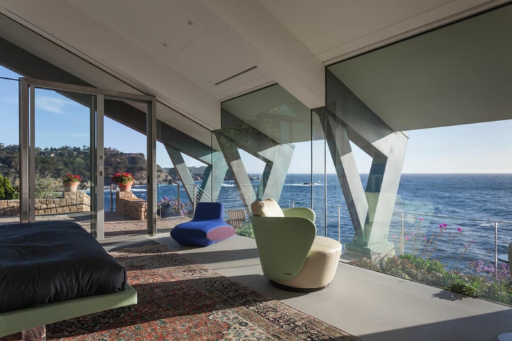Chambre avec accès sur la terrasse et vue sur l’eau chambre luxe avec vue sur l'océan
